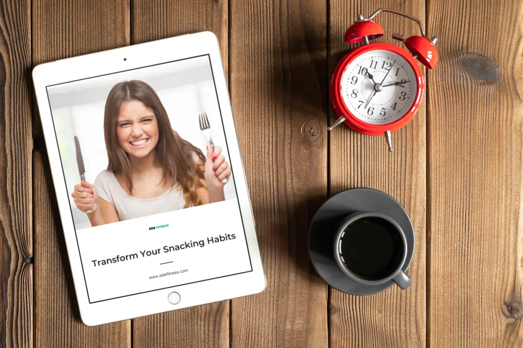 iPad featuring a clock and a cup of coffee on a wooden table, symbolizing the importance of timing and healthy snacking habits.